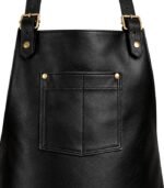 Black leather apron with pocket and gold-tone hardware