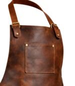Brown leather apron with adjustable straps and a chest pocket