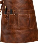 Brown leather apron with multiple pockets and two pens