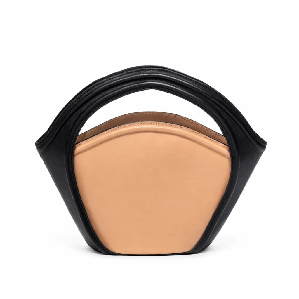 Two-tone leather handbag with black handles and tan body