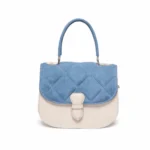 Quilted blue suede and ivory leather handbag with top handle and buckle closure