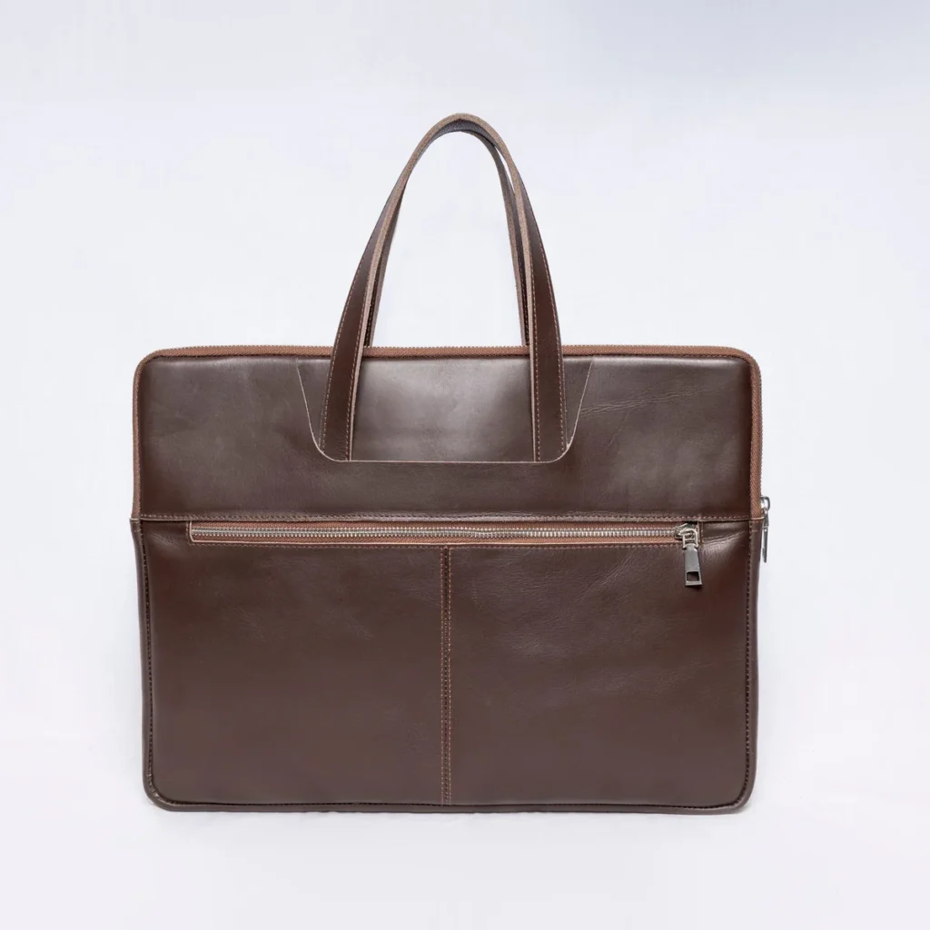 Brown leather briefcase with double zippers and top handles