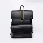 Black leather backpack with yellow accent strap and silver hardware