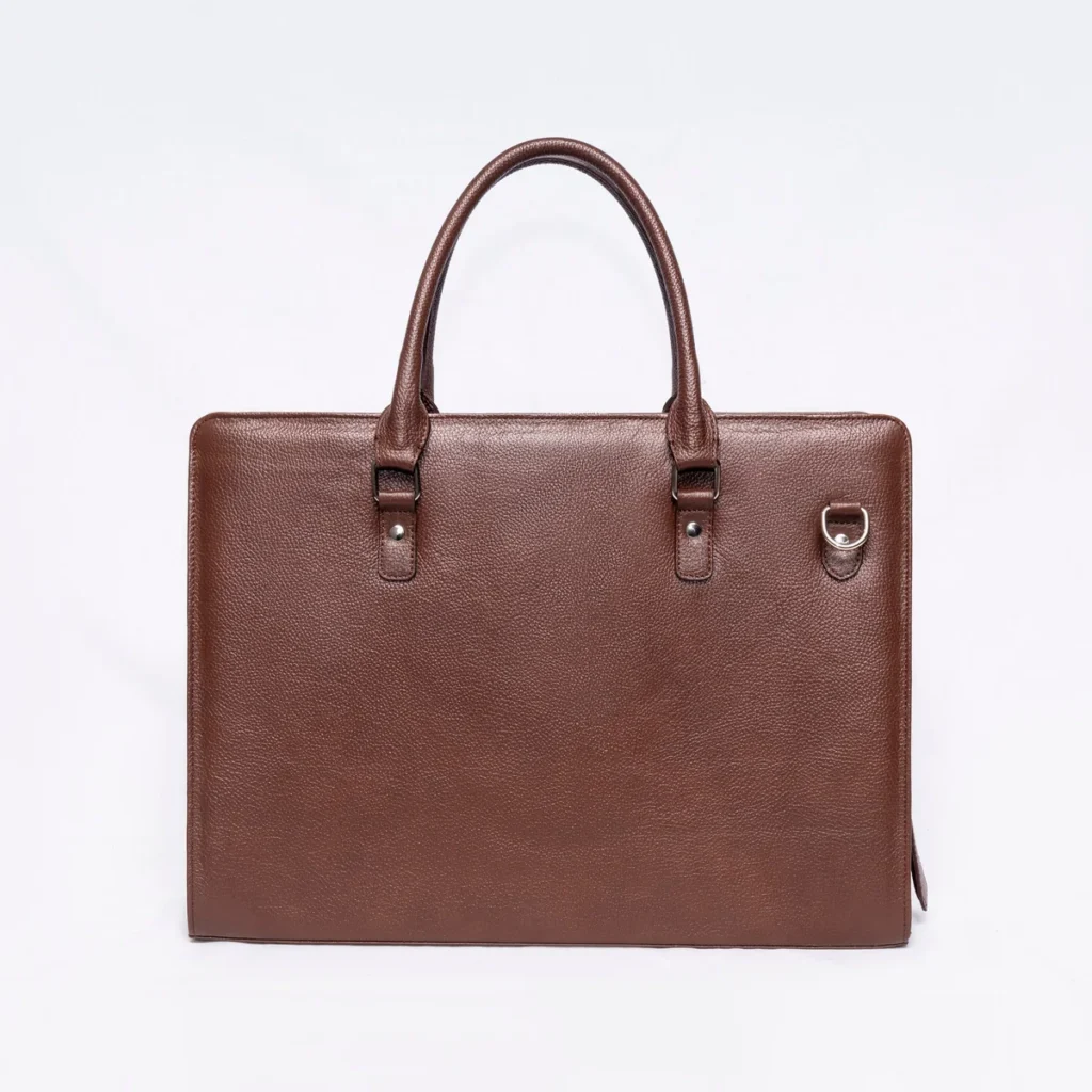 Brown pebbled leather briefcase with double handles and a side D-ring