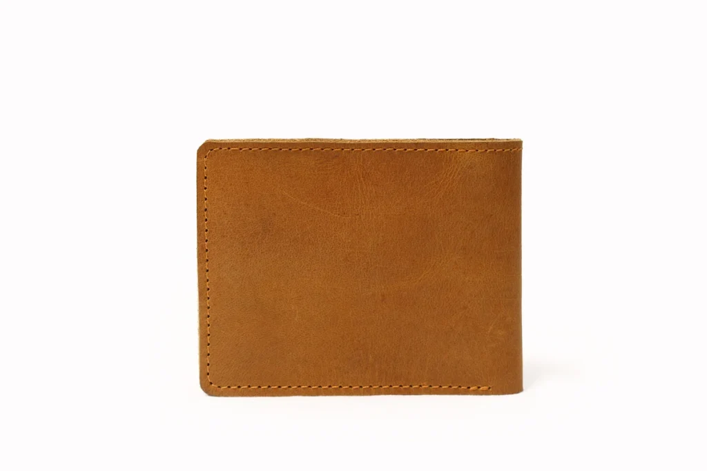 Brown leather bifold wallet with visible stitching