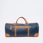 Blue and brown leather duffel bag with zippered pocket