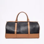 Black and tan leather duffel bag with twin handles