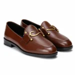 Brown leather loafers with gold horsebit detail