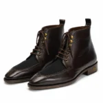 Dark brown leather lace-up boots with black fabric toe accents