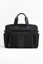 Black leather briefcase with multiple zip compartments and stitched detailing
