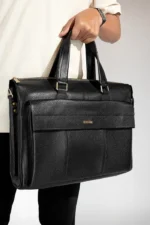 Black leather briefcase with zippered top and front pocket