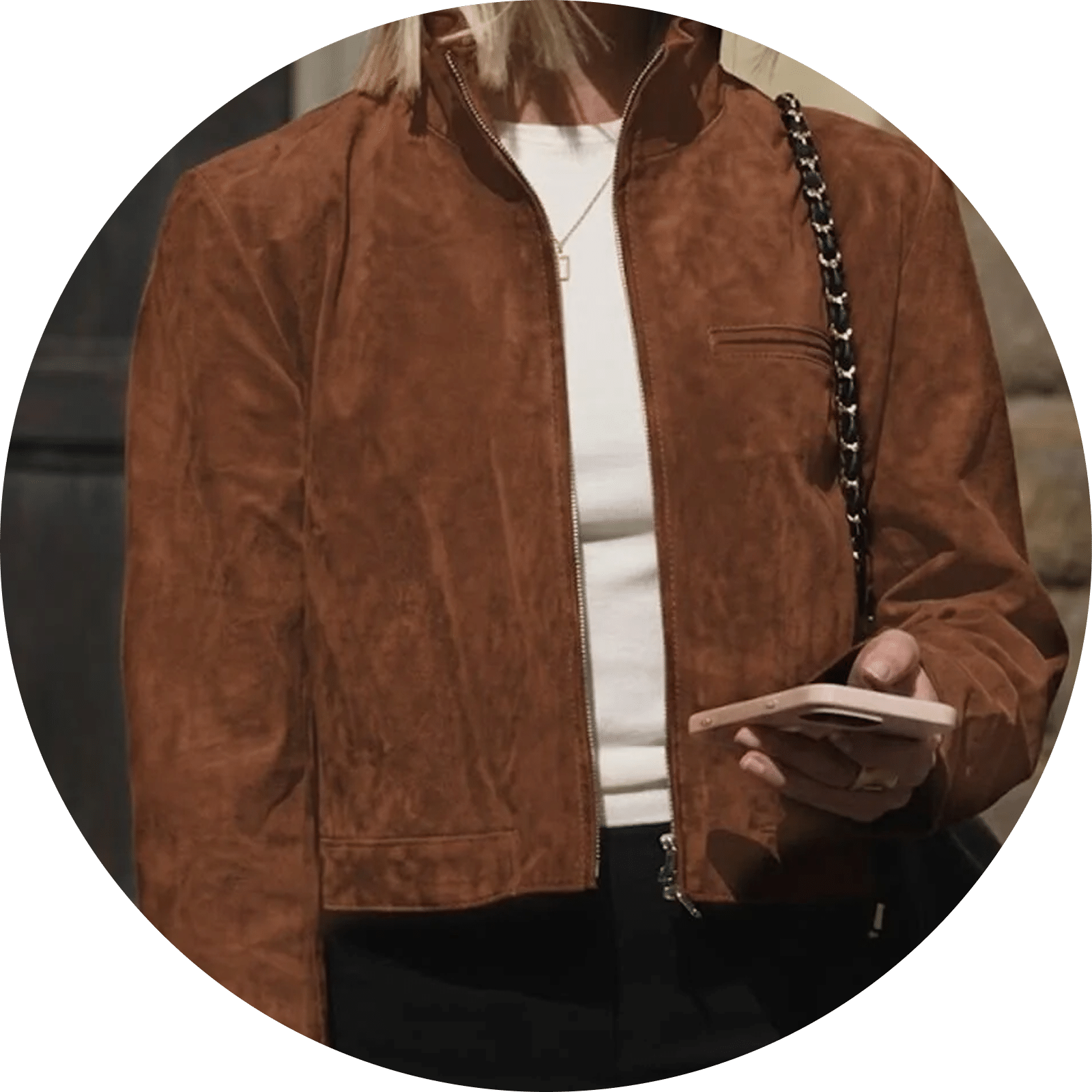 Brown suede cropped bomber jacket with white top and black pants
